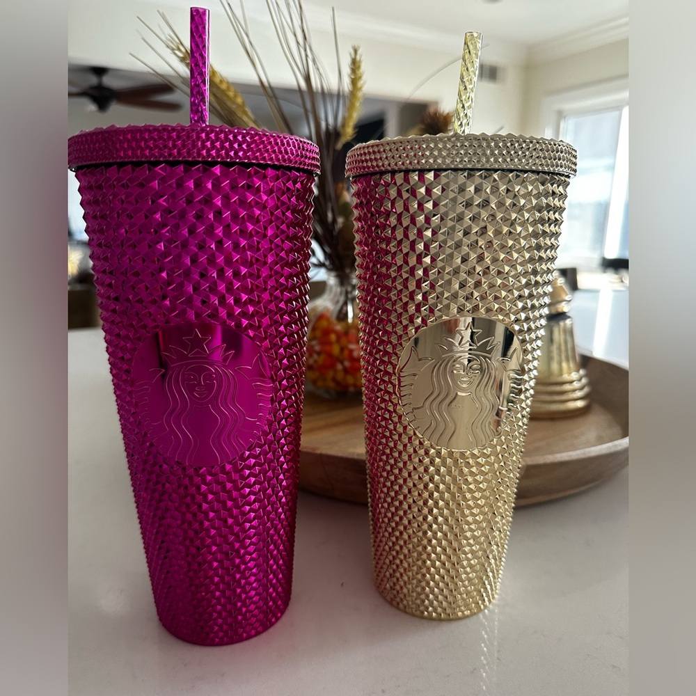 Gold and pink studded Starbucks tumbler